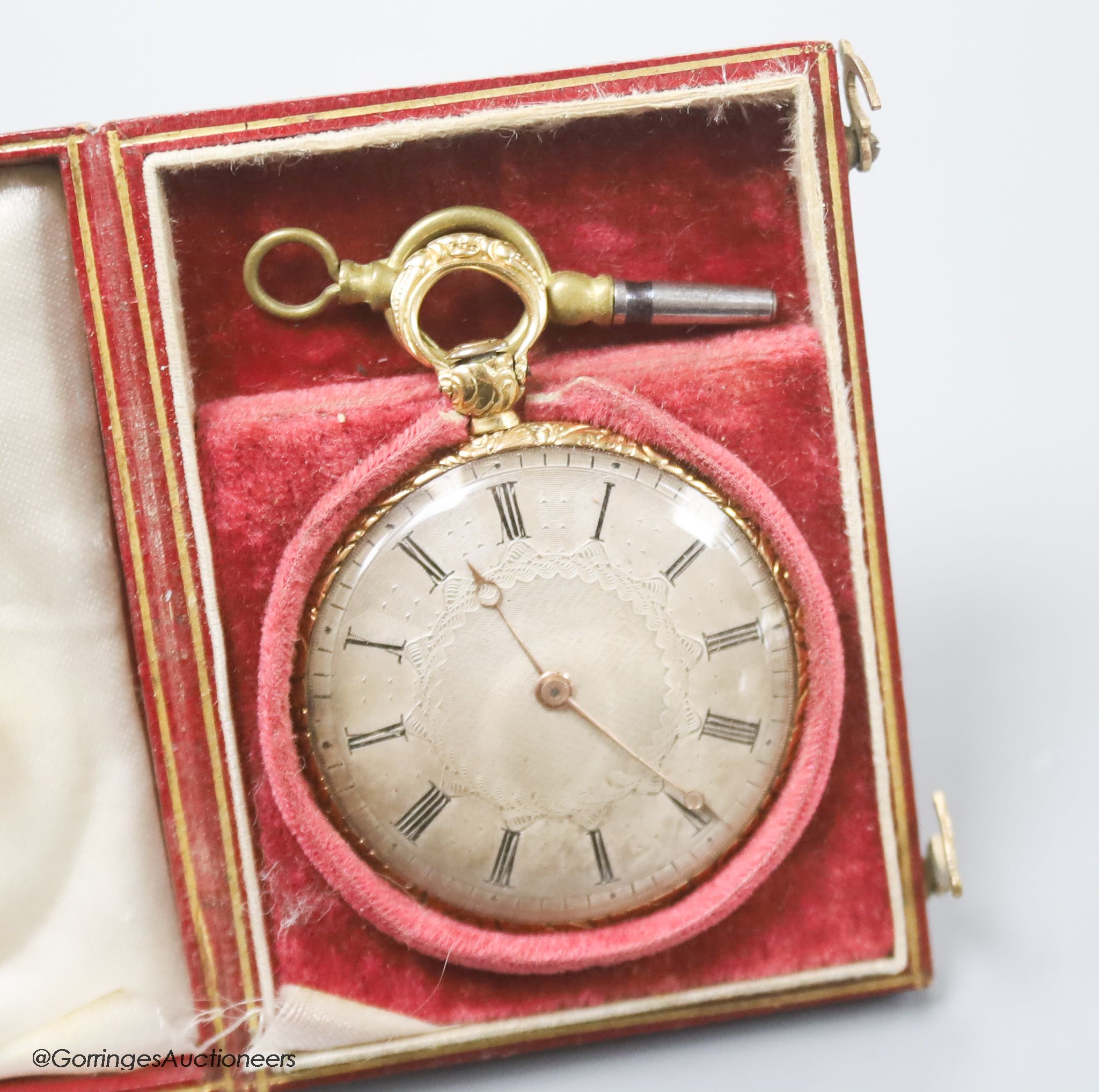 A Swiss cased 19th century engine turned yellow metal open face keywind fob watch, with silvered Roman dial